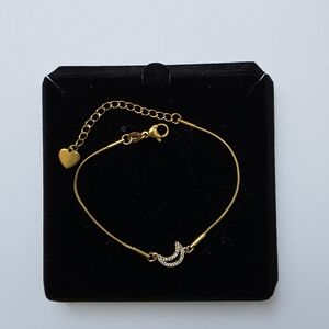 Elegant Gold and Silver Crescent Bracelet
